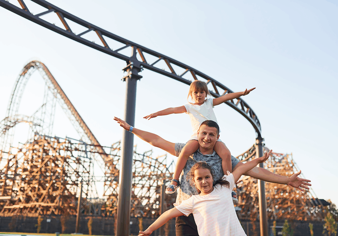 Theme Park Social father-have-fun-with-his-dauthers-at-children Theme Park Social father-have-fun-with-his-dauthers-at-children